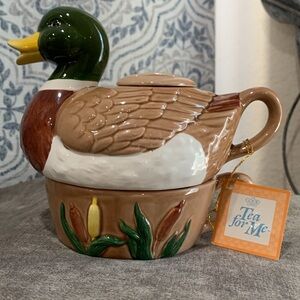 VINTAGE CERAMIC DUCK TEA POT AND TEA CUP .